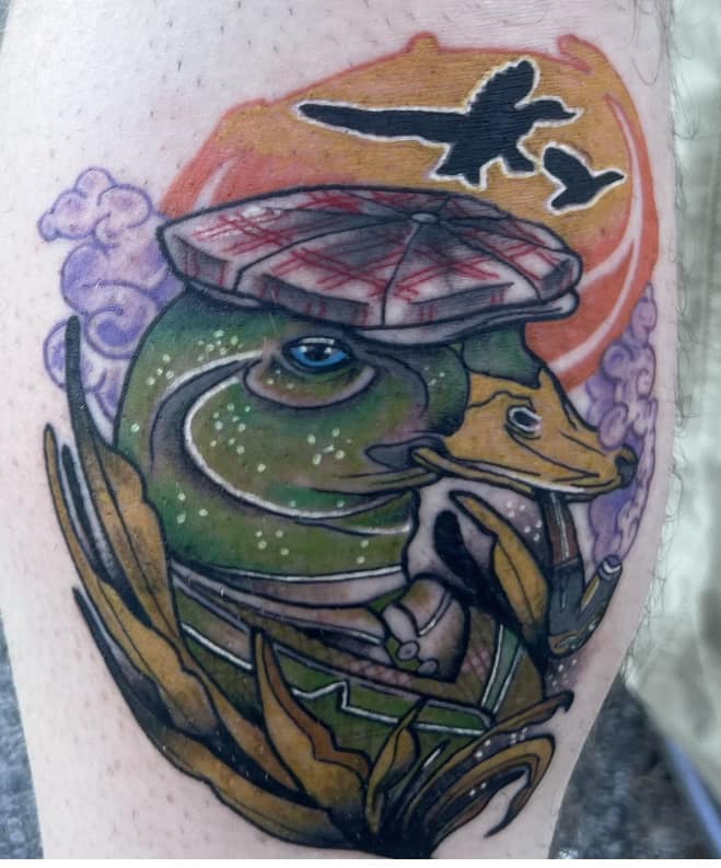 Colorful duck tattoo with plaid cap